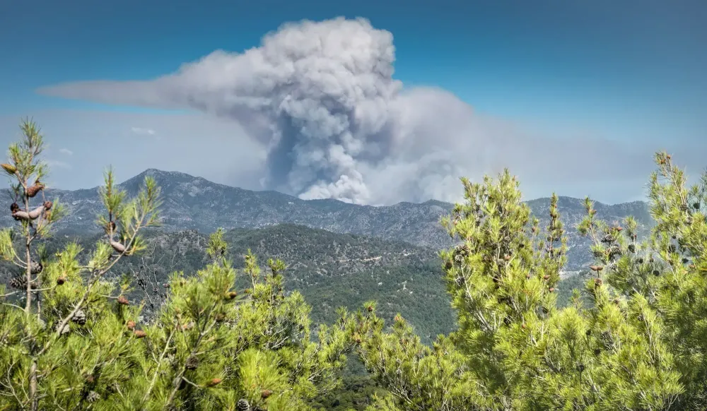 Smoke over mountains from a distant wildfire